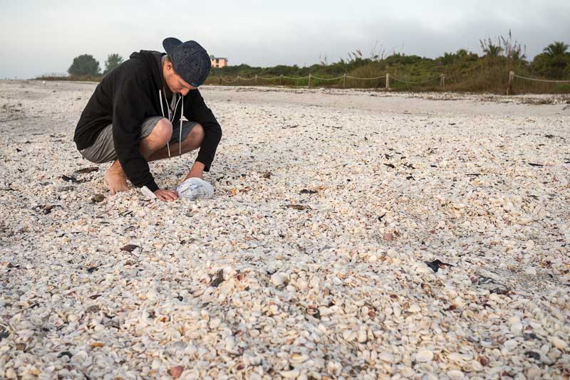 Jakob shelling on Sanibel